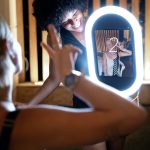 Mobile photo booth ring light capturing dance floor moments at a wedding